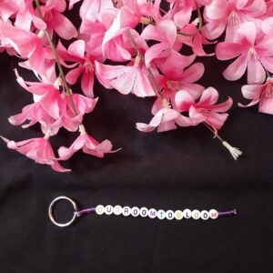 Our Room To Bloom multicolored keychains with purple beads